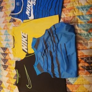 4 size medium Boys sleeveless tshirts